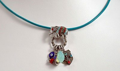 Crystal Elephant on Turquoise Leather